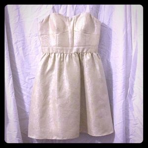 Light gold sparkly strapless cocktail dress
